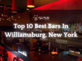 Top 10 Best Bars In Williamsburg New York - a bar counter with beautiful lights and different kinds of alcohol
